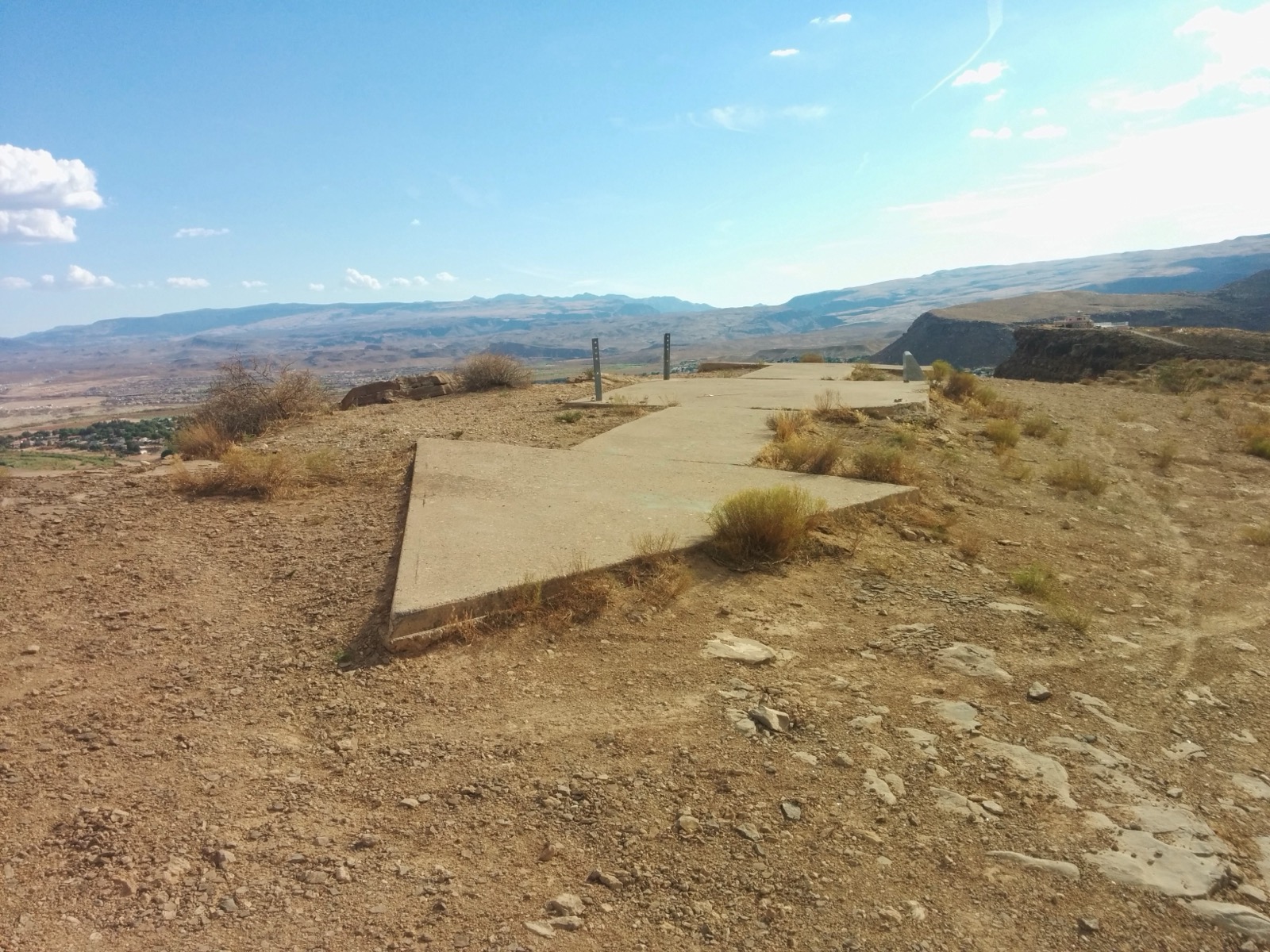 Concrete arrow airway marker and beacon site preserved on a bluff in Utah