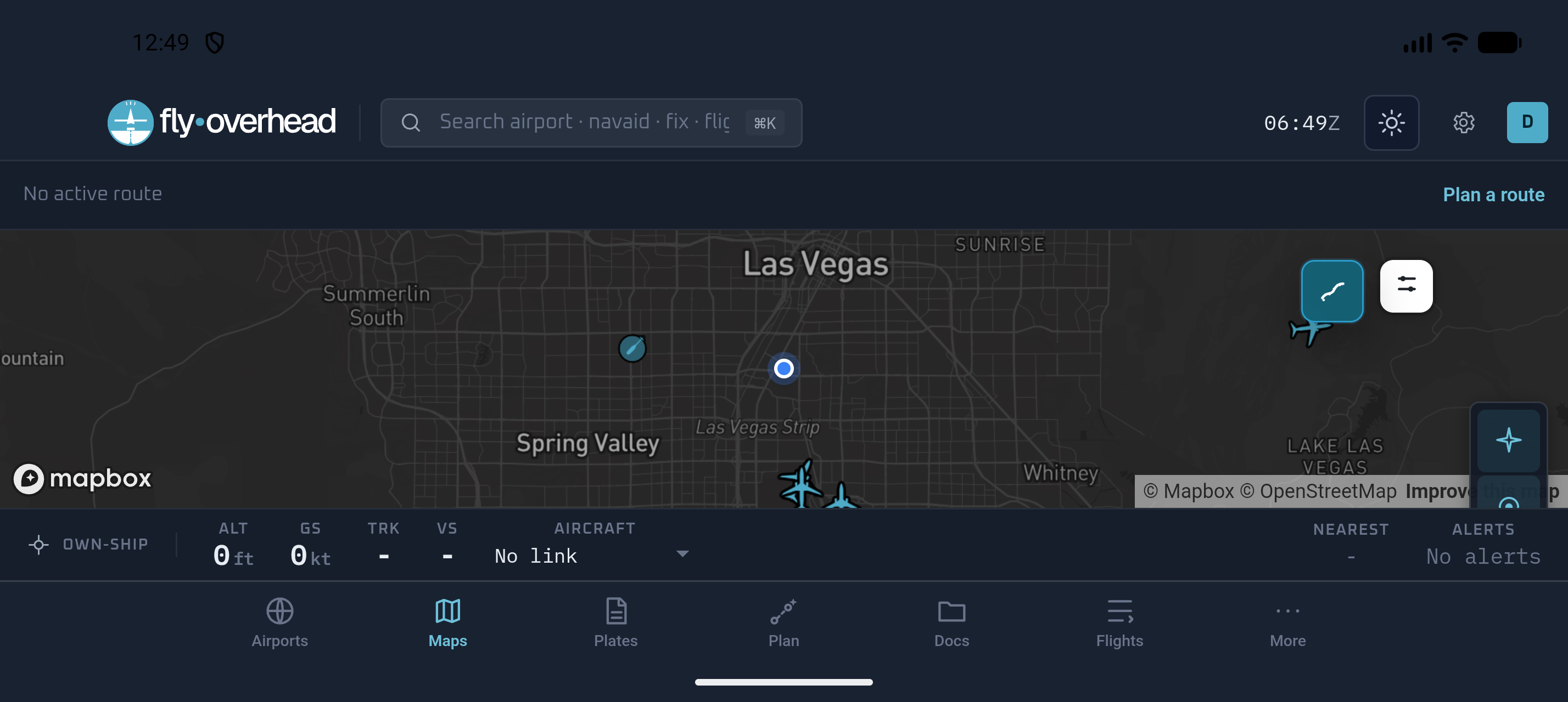 Fly Overhead Android EFB in landscape showing live traffic, ownship, nearest-airport and alert status, and map layers near Las Vegas
